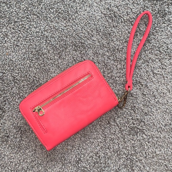 Charming Charlie Handbags - *NEVER BEEN USED* Coral wristlet wallet